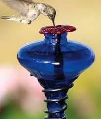 Hummingbirds are one of nature's most energetic creatures that brightly colored feeder stakes. Mini Blossom Hummingbird Feeders On Stake 4 Colors The Birdhouse Chick