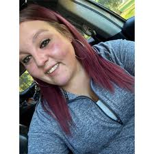 Finding comfort in music after loss, specifically Jelly-roll's song 'I am  not ok'