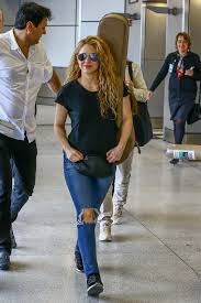 Shakira blue is on facebook. Shakira Rocks Ripped Blue Jeans Black Top And A Guitar On Her Back As She Touch Down In Miami Florida 070318 9