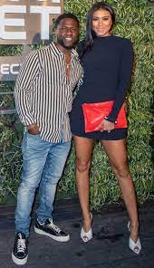 Kevin Hart S Pregnant Wife Eniko Shows Off Growing Baby Bump In Her Stretchy Vacay Pants Kevin Hart Mens Fashion Casual Outfits Pregnant Wife