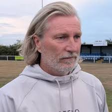 Cheltenham sign ex-World Powerlifting champion and muscle model as a centre 