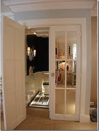 These Are Mirrored French Doors Leading To A Small Bath With Black Walls Squeal French Closet Doors French Doors French Doors Bedroom