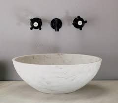 A wall hung stone counter top with under counter basin. Design Gallery Stone Countertop Basin Ideas Stone Specialists Inc