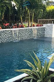 Swimming Pool Feature Wall Design In 2021 Feature Wall Design Glass Pool Tile Outdoor Inspirations