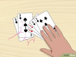 The top card from the deck is flipped face up and put beside the deck to start the discard pile. 4 Ways To Play The Card Game 13 Wikihow