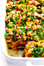 How to make an easy chicken enchilada casserole recipe. This Layered Chicken Enchilada Casserole Is A Must Make Enchilada Casserole Recipes Chicken Enchilada Casserole Chicken Enchilada Casserole Recipe