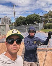 Prime time and JMM holding down the 77th Punahou Relays pits. Mike Blake  (not pictured)