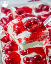 Prepare and bake cake according to package directions for a 9 x 13 baking dish. Cherries In The Snow Poke Cake Video The Country Cook