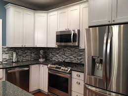 Problems were with delivery (one cabinet arrived broken) and with lowes ordering wrong size, wrong replacement and excess material. Kraftmaid Vantage Dove White Kitchen Remodel Chelsea Lumber Company