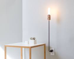 Incredibly Lightweight Wald Is A Lamp Anchored By A Wall Socket Swing Arm Wall Lamps Lamp Wall Mounted Lamps