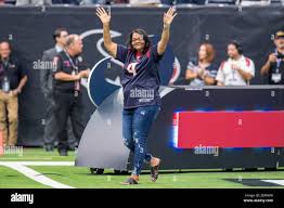 October 6, 2019: Deann Watson, mother of Deshaun Watson, enters the field  as an honorary captain prior to an NFL football game between the Houston  Texans and the Atlanta Falcons at NRG