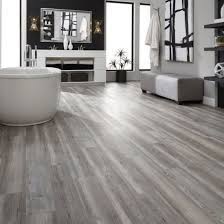 Oak can come in a variety of shades, so please take a look at our collection to find a shade of grey vinyl tiles that perfectly matches your taste and decor! China Dark Grey Oak Spc Rigid Vinyl Flooring Tiles For Hotel China Pvc Floor Wood Flooring
