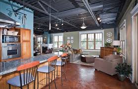 Home plans with a loft feature an upper story or attic space that often looks down onto the floors below from an open area. How To Make An Industrial Loft Feel Like Home