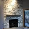 A stone veneer fireplace is a simple way to add drama and old world elegance to your fireplace. 1