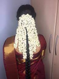 Red Kanchipuram Silk Saree Hairstyle And Makeup With Jasmine Flowers Tamil Hindu Wedding Bridal Hair Buns Braids For Long Hair Indian Long Hair Braid