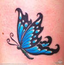 Small Blue Butterfly Tattoo Blue Butterfly Tattoo Butterfly Tattoo Designs Butterfly Tattoo On Shoulder