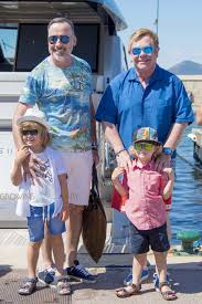 Kids sing elton john is a english album released on aug 2005. Elton John Vacations With His Family In St Tropez