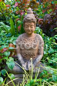 A unique collection of buddhist and other sacred statues, carefully selected for their beauty, enhancing garden of buddhas. Buddha Statue Im Garten Stockfotos Freeimages Com