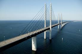 The öresund bridge is a key piece of impressive architecture and it is definitely the scenic route from copenhagen to malmö by car or train. This Amazing Bridge Turns Into A Tunnel And Connects Denmark And Sweden Twistedsifter