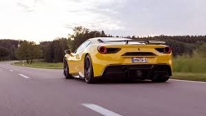 The 488's torque curve is a series of steep inclines rather than one monotonous plateau a delight to drive both fast and slow, it hardly stops enthralling you. Hd Wallpaper Ferrari 488 Gtb Yellow Supercar Back View And Speed Wallpaper Flare