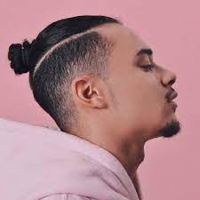 Undercut High Bun For Men Blonde Hair Undercut Mens Braids Hairstyles Man Bun Haircut