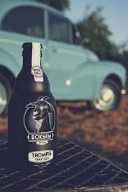 Get Your Goat I Am Not Sure What I Love More The Black Bottle With The Goat Or That Car Craft Beer Packaging Beer Bottle Design Beer Packaging
