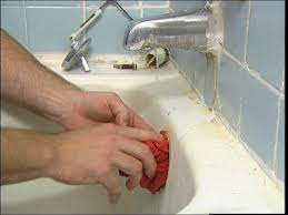 Renovating and old home built in 1970, exoman cleans a tub drain with a plunger and a flexible plastic snake. How To Unclog A Bathtub Using The Trip Lever How Tos Diy