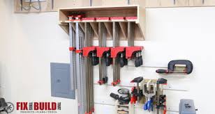 A diy clamp rack that mounts to the wall and swings out so that you can store clamps on both sides. Space Saving Parallel Clamp Rack Plans Fixthisbuildthat