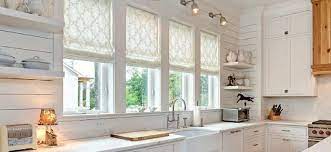 This kitchen corner sink by reath design is beyond dreamy, from the moody gray marble sink to the exposed brick and terra cotta tiles. Blinds For Kitchen Sink Windows A Complete Guide Zebrablinds
