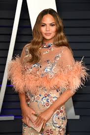 Chrissy teigen's greatest modeling throwbacks. Chrissy Teigen Shares Photo Of Endometriosis Surgery Scar Love Yourself Glamour