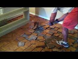 Then the first row of parquet is lifted, starting at one end of the room. Removing Parquet Wood Flooring Can Be A Very Difficult Action When Preparing For A New Hardwood Installa Wood Parquet Flooring Parquet Hardwood Diy Wood Floors