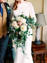 English ivy and rose leaves mix in between all of the roses to really set them off. 470 Just Bouquets Ideas In 2021 Wedding Bouquets Bridal Bouquet Wedding Flowers