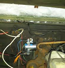 Black W White Stripe To The Push Button Push Button Sends A Ground To This Terminal Of The Solenoid Two Small Orange Wires On The Bottom Go Glow Fire Light