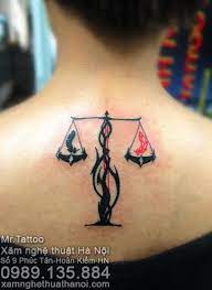 Libra tatoo libra scale tattoo libra zodiac tattoos libra symbol sagittarius flower vine tattoos justice tattoo drawing competition signo libra. Tribal Libra Scales Tattoo On Upper Back Libra Scale Tattoo Scale Tattoo Tattoos