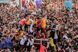 It's clad in a dark red robe with gold patterns. What You Need To Know About The Black Nazarene Philstar Com