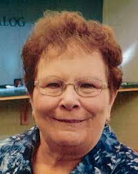 I'm still trying to take this one in. My mom Mrs. LUCILLE TATE, Retired  Librarian of David W. Carter High School 1982