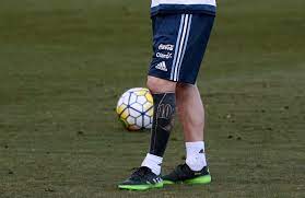 Lionel messi has a tattoo which stands out on the bottom of his left leg. Lionel Messi New Tattoo Barcelona Star Shows Off Bizarre Inking In Argentina Training