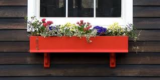 A planter box is ideal for a kitchen window herb garden. How To Build A Window Planter Window Planter Plans