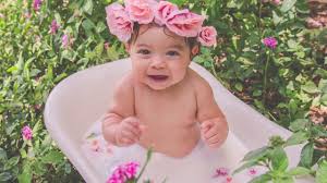 You want to use enough milk to see it in the water, so it might be best to not run a high bath. Baby Milk Bath Photoshoot Online