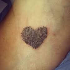 In these designs both people use one of their thumbs to create half of the heart. Would Like To Do My Parents Fingers Fingerprint Tattoos Thumbprint Tattoo Fingerprint Heart Tattoos