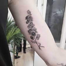 A Garden To Walk In And Immensity To Dream In Meaning Flower Tattoo Blumen Tattoo Blossom Tattoo Realistic Tattoo Realistisches Tattoo Fotorealistisches Tattoo Delphinium Tattoo Birth Flower Tattoos Tattoos