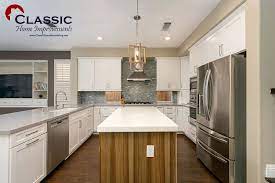 Make Sure The Adjacent Space Looks Cohesive When You Remodel Your Kitchen Notice The Living Room Cabinetry Matc Kitchen Remodel Photos Kitchen Remodel Kitchen