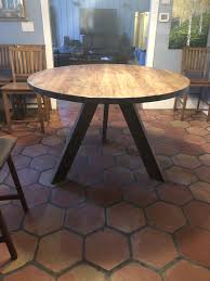 Three Legged Round Table Made From Antique Wood And Colored Mottled Dark Brown Table How To Antique Wood Large Tables