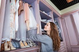 Closet island with cabinets, shelves and one drawer. How To Turn A Spare Room Into Your Dream Closet Dressing Room