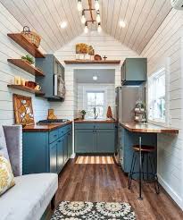 Gorgeous Green Custom Cabinets And Eight Feet Of Butcher Block Countertops Provide A Warm Con Tiny House Kitchen Tiny House Interior Design Tiny House Interior