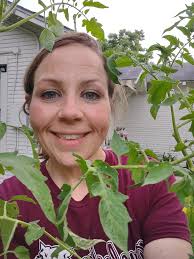 My tomato plant growth. She's almost as tall as me now ! 🍅