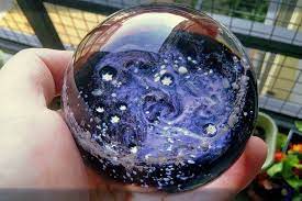 Galaxy Orb With Cremains Asteroid Belt And Glow In The Dark Stars Memorial Paperweights Memorial Orbs The Darkest Star