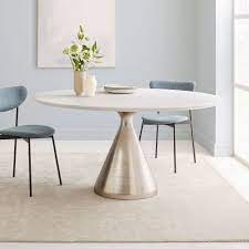 These round, white pedestal dining tables take that ideal of efficiency and mix it with style and class. Buy Online Silhouette Pedestal Round Dining Table White Marble Brushed Nickel Now West Elm Uae
