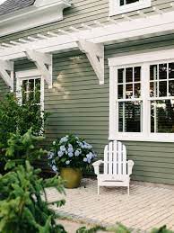 Earth tones like gray, browns and beige will work well with sage green, especially on homes in wooded. 10 Sage Green Decorating Ideas That Feel Very 2020 Cottage Exterior Colors Green House Exterior Best Exterior House Paint