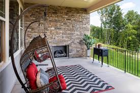 Drees Homes Rowan Covered Patio With Stone Fireplace Model Homes Patio Custom Homes